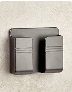 Sticky storage box for charging mobile phones